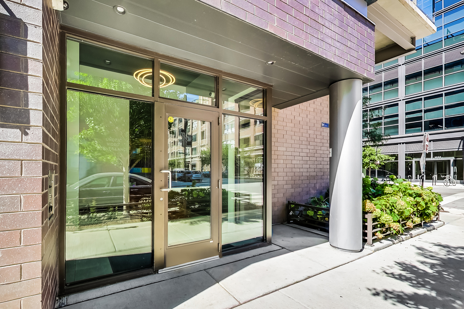 40 North Carpenter Street, Unit 5N Chicago, IL 60607 - Photo 28 of 29 a glass door with glass door
