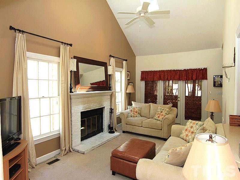 Cathedral ceiling, fireplace, easy access to other rooms.