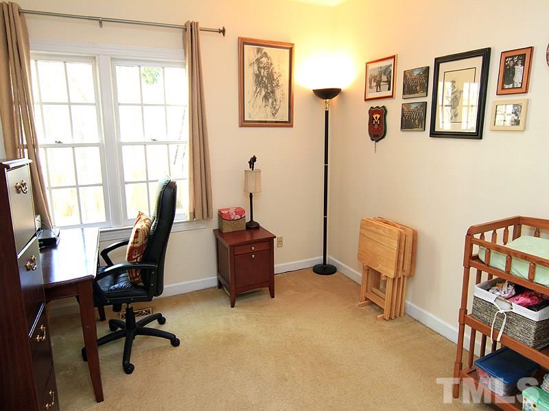 1709 Briarforest Place Raleigh, NC 27615 - Photo 9 of 18 This downstairs room is used as a great office space. With an added closet, it could be a bedroom.