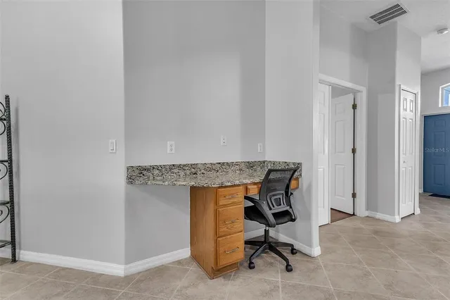 a view of workspace with chair