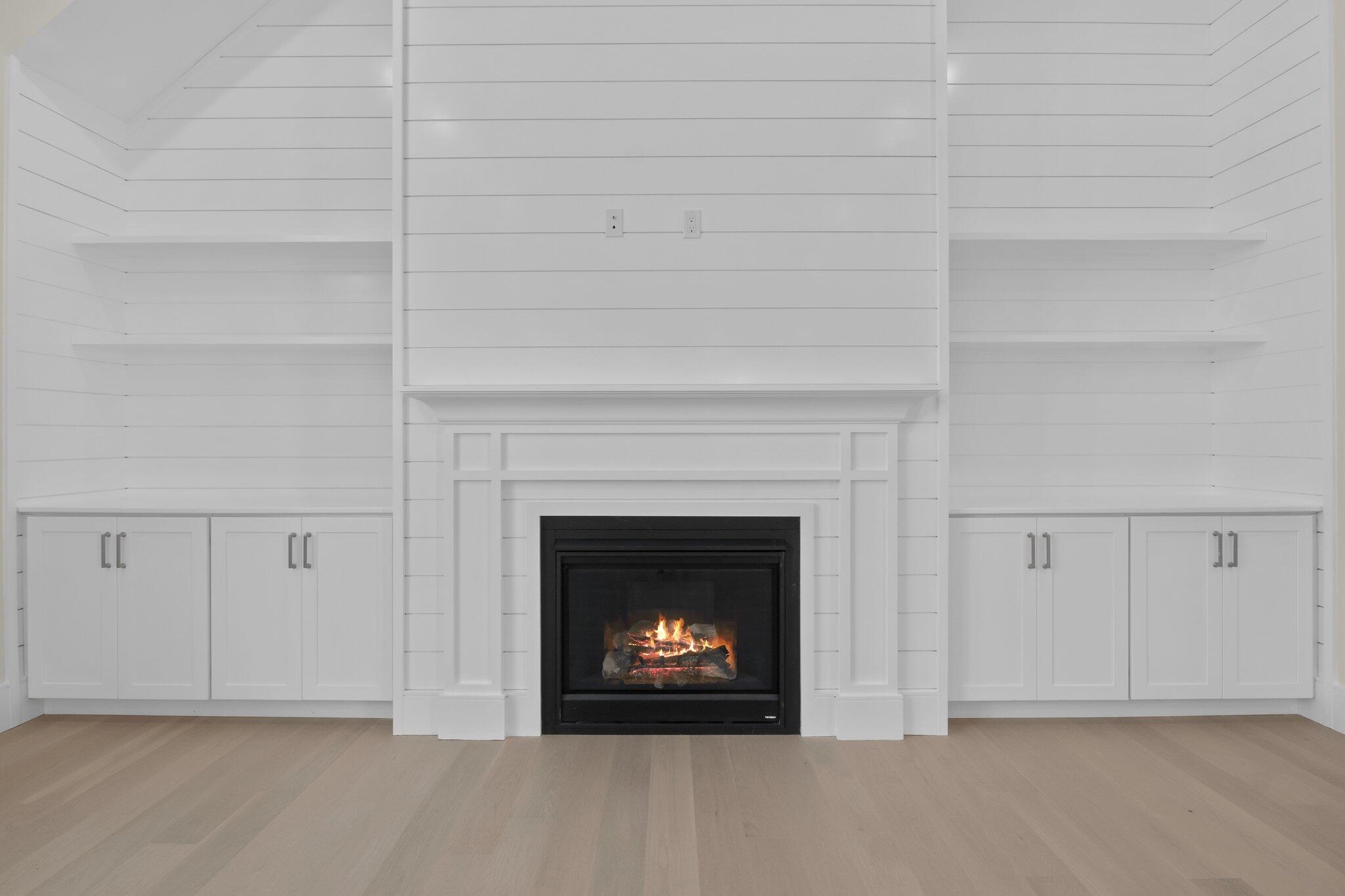 28 Yardarm Drive Mashpee, MA 02649 - Photo 17 of 38 a living room with a fireplace