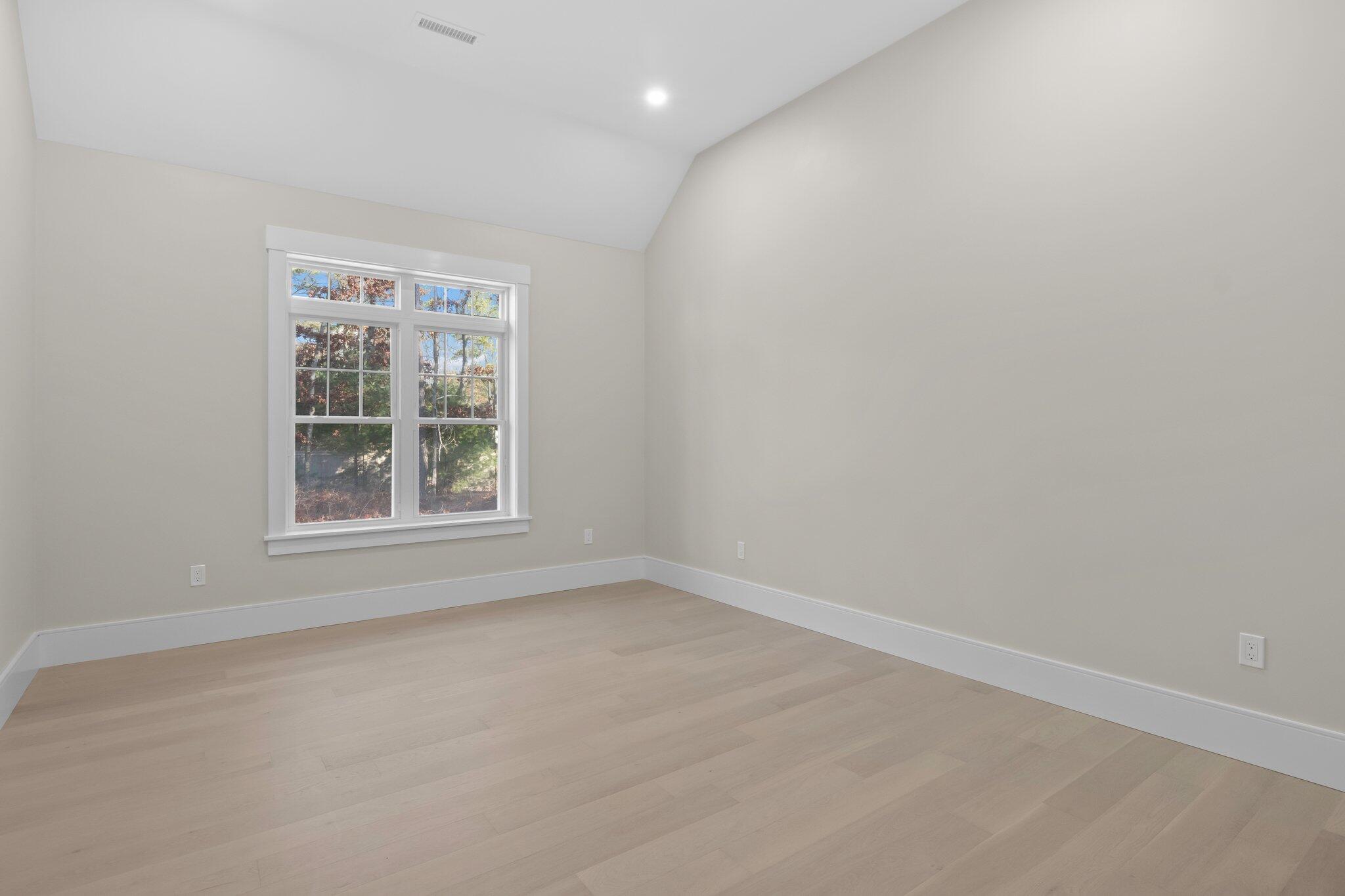 28 Yardarm Drive Mashpee, MA 02649 - Photo 32 of 38 an empty room with windows