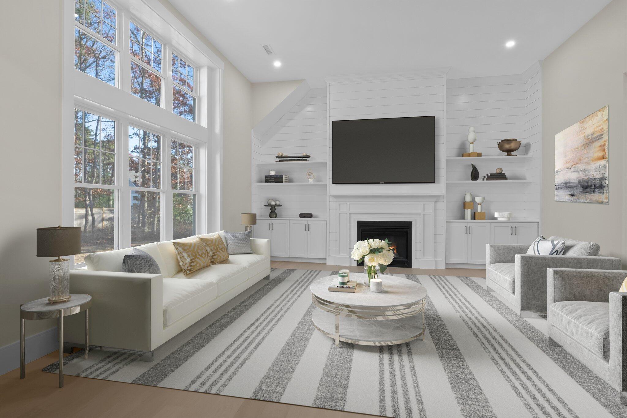 28 Yardarm Drive Mashpee, MA 02649 - Photo 5 of 38 a living room with furniture fireplace and a flat screen tv