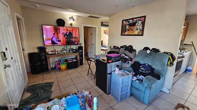 a kitchen with stainless steel appliances granite countertop a stove and a refrigerator