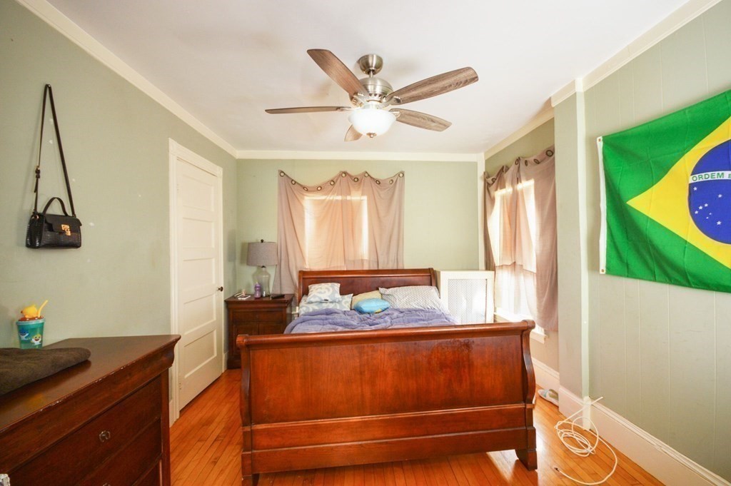 3 Hunnewell Street Melrose, MA 02176 - Photo 24 of 33 a room with window and ceiling fan