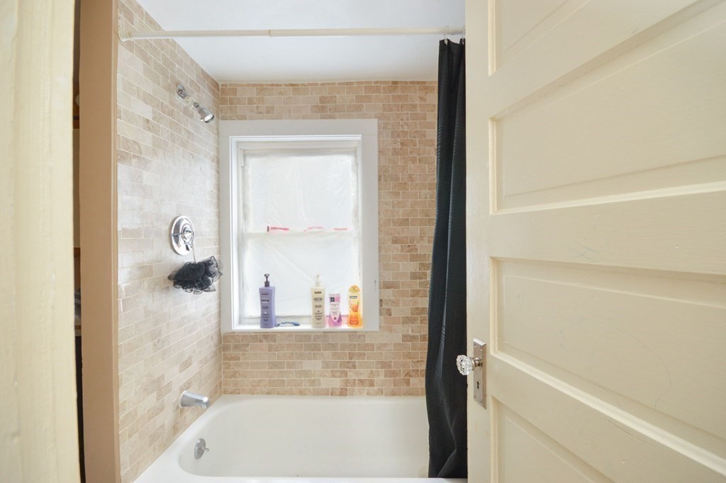 3 Hunnewell Street Melrose, MA 02176 - Photo 25 of 33 a bathroom with a bathtub