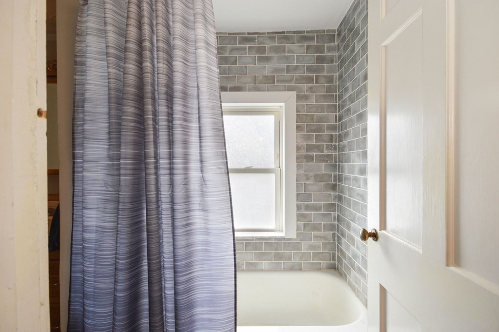 3 Hunnewell Street Melrose, MA 02176 - Photo 30 of 33 a bathroom with a shower