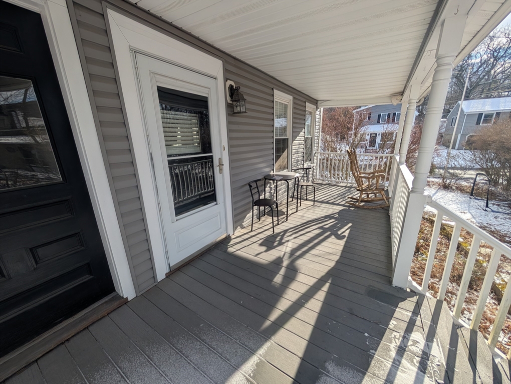 3 Hunnewell Street Melrose, MA 02176 - Photo 31 of 33 a view of a balcony with furniture
