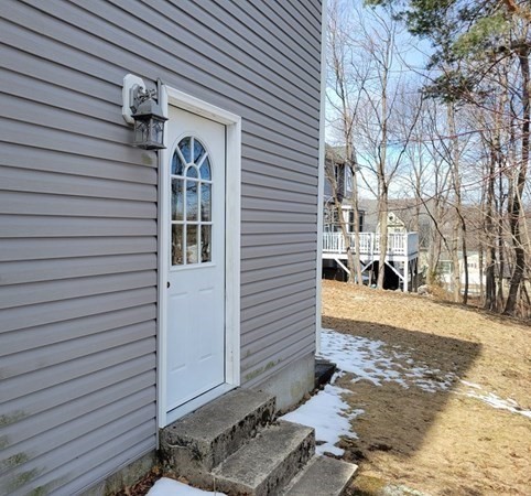 3 Hunnewell Street Melrose, MA 02176 - Photo 5 of 33 a view of a street with a house
