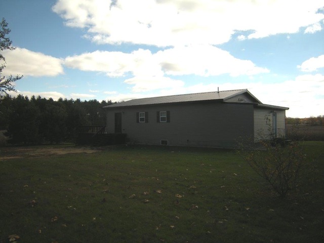 1755 Winding Road Amboy, IL 61310 - Photo 1 of 10 a view of outdoor space and yard