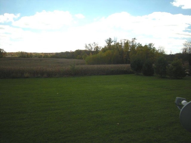 1755 Winding Road Amboy, IL 61310 - Photo 10 of 10 a view of field with river in background