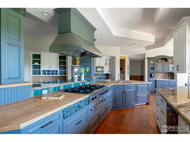 a living room with furniture fireplace and flat screen tv