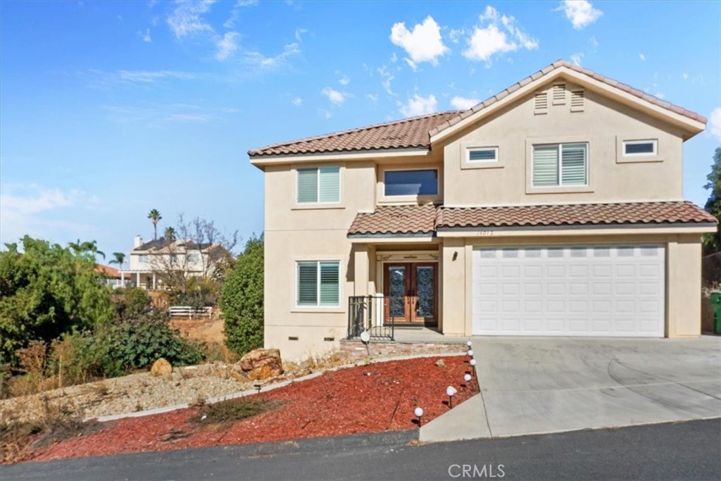 14012 Quailridge Drive Riverside, CA 92503 - Photo 1 of 44 a front view of a house with yard