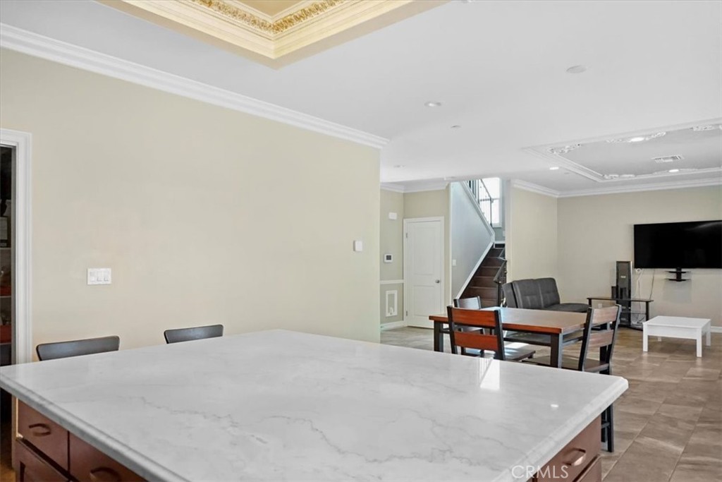 14012 Quailridge Drive Riverside, CA 92503 - Photo 14 of 44 a bedroom with furniture and a wooden floor