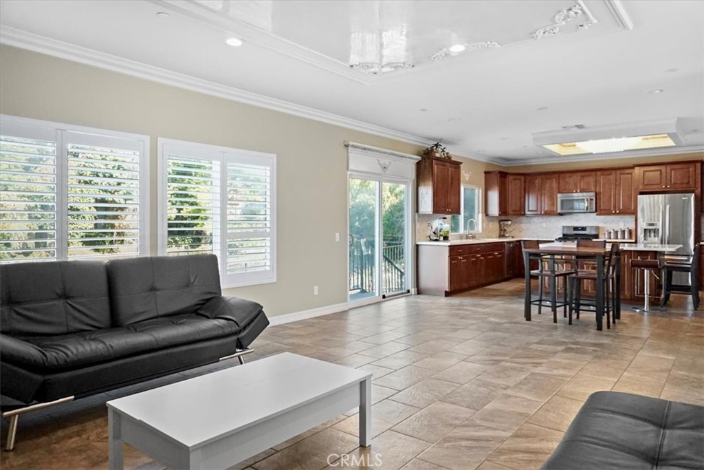 14012 Quailridge Drive Riverside, CA 92503 - Photo 19 of 44 a living room with furniture and a large window