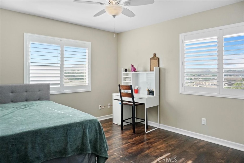 14012 Quailridge Drive Riverside, CA 92503 - Photo 35 of 44 a bedroom that has a bed and a desk in it