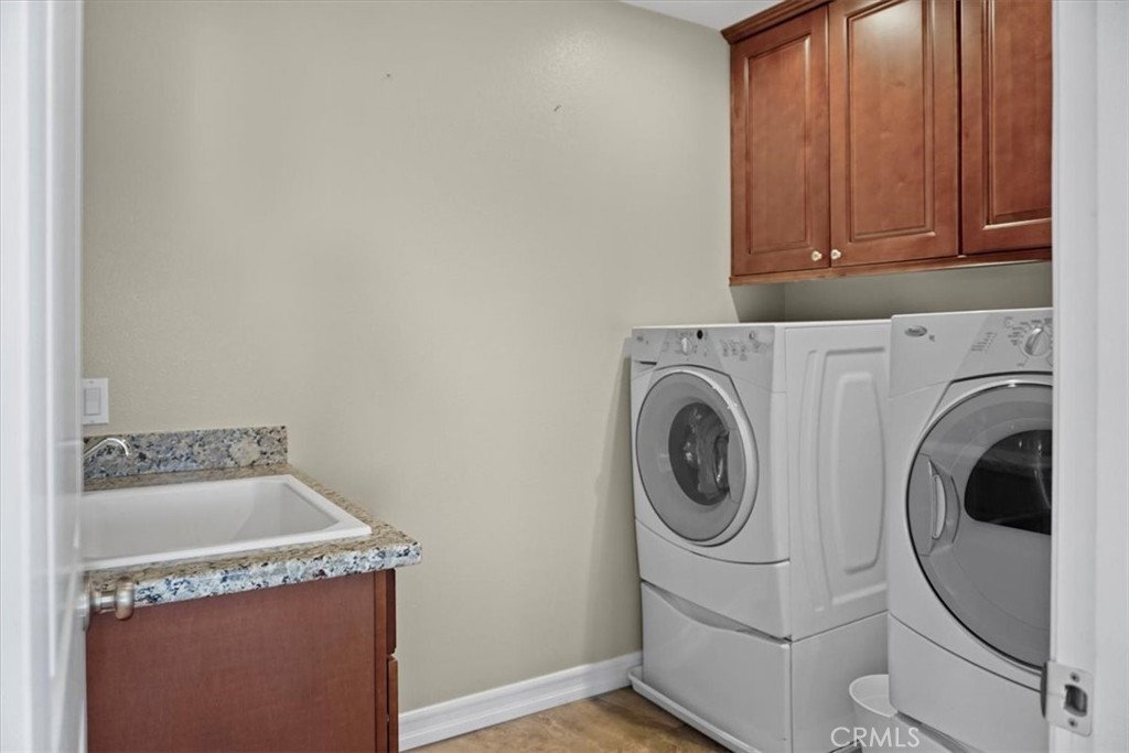 14012 Quailridge Drive Riverside, CA 92503 - Photo 37 of 44 a utility room with dryer and washer