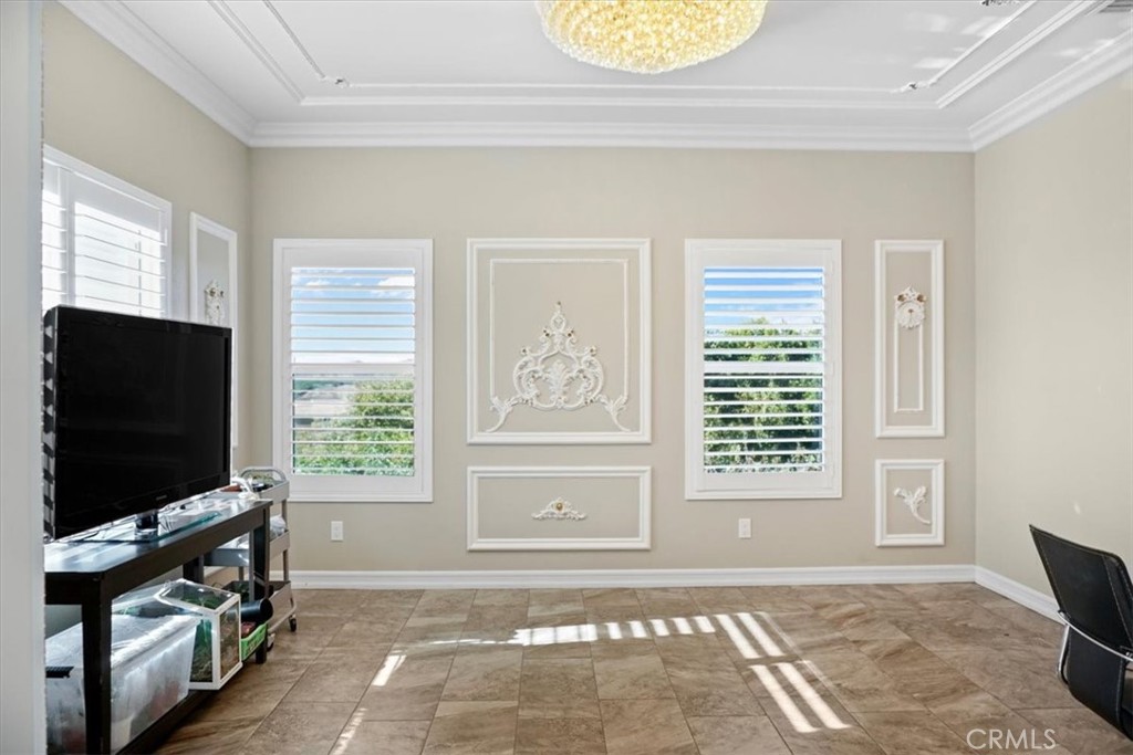 14012 Quailridge Drive Riverside, CA 92503 - Photo 8 of 44 a living room with window hardwood floor and flat screen tv
