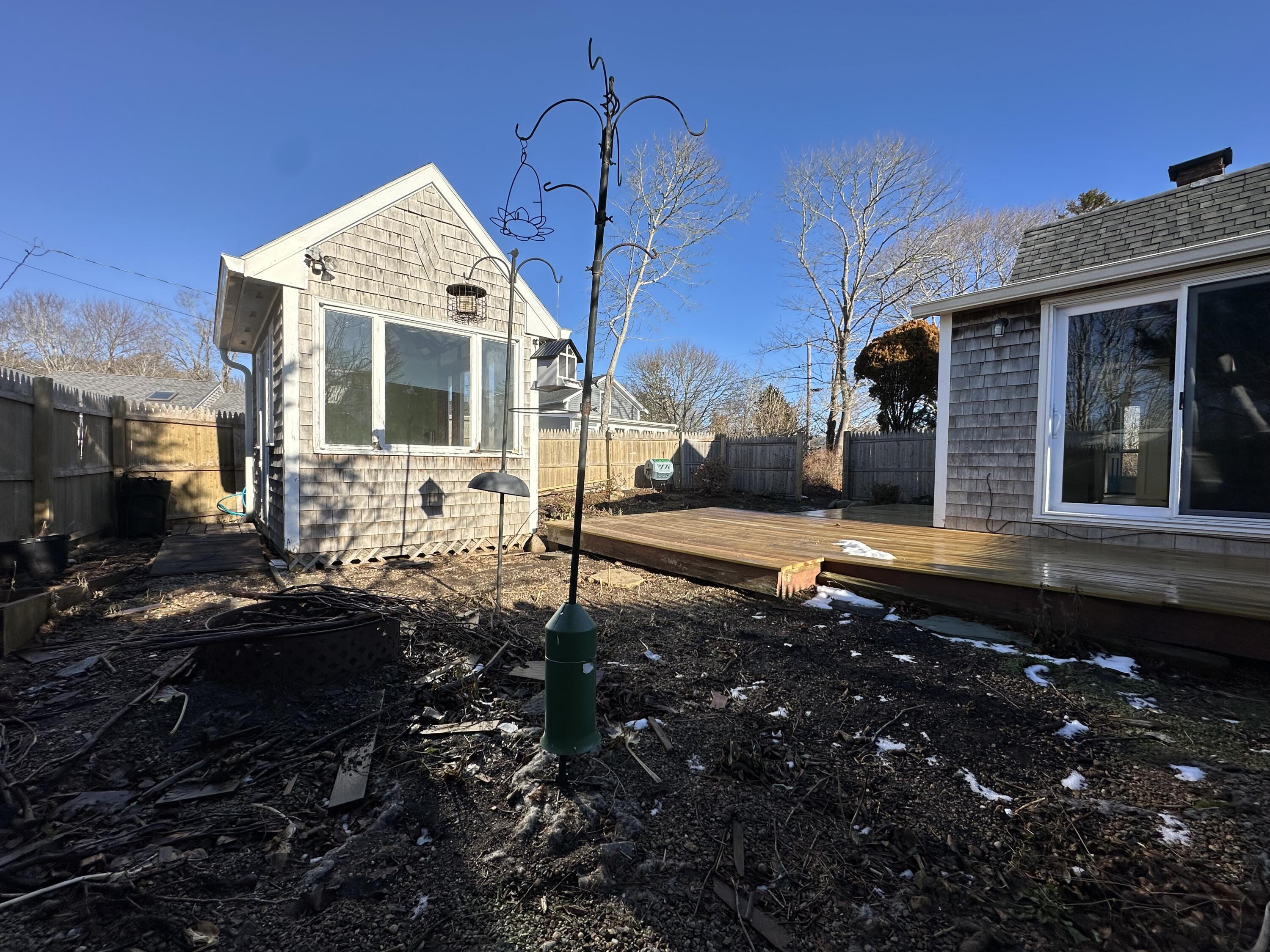 117 Oak Neck Road Hyannis, MA 02601 - Photo 12 of 25 a view of a house with backyard and sitting area