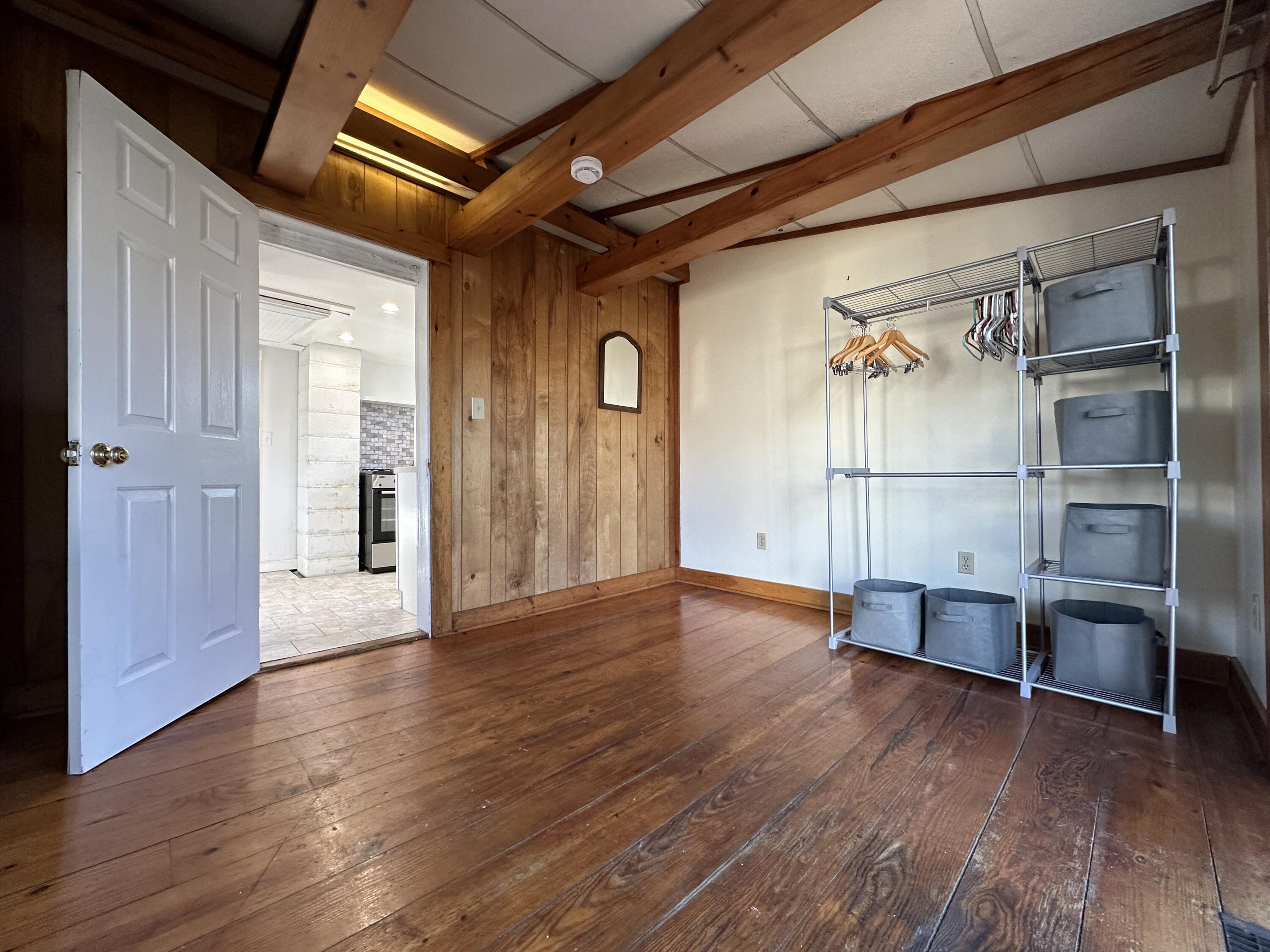 117 Oak Neck Road Hyannis, MA 02601 - Photo 20 of 25 a view of an empty room with wooden floor
