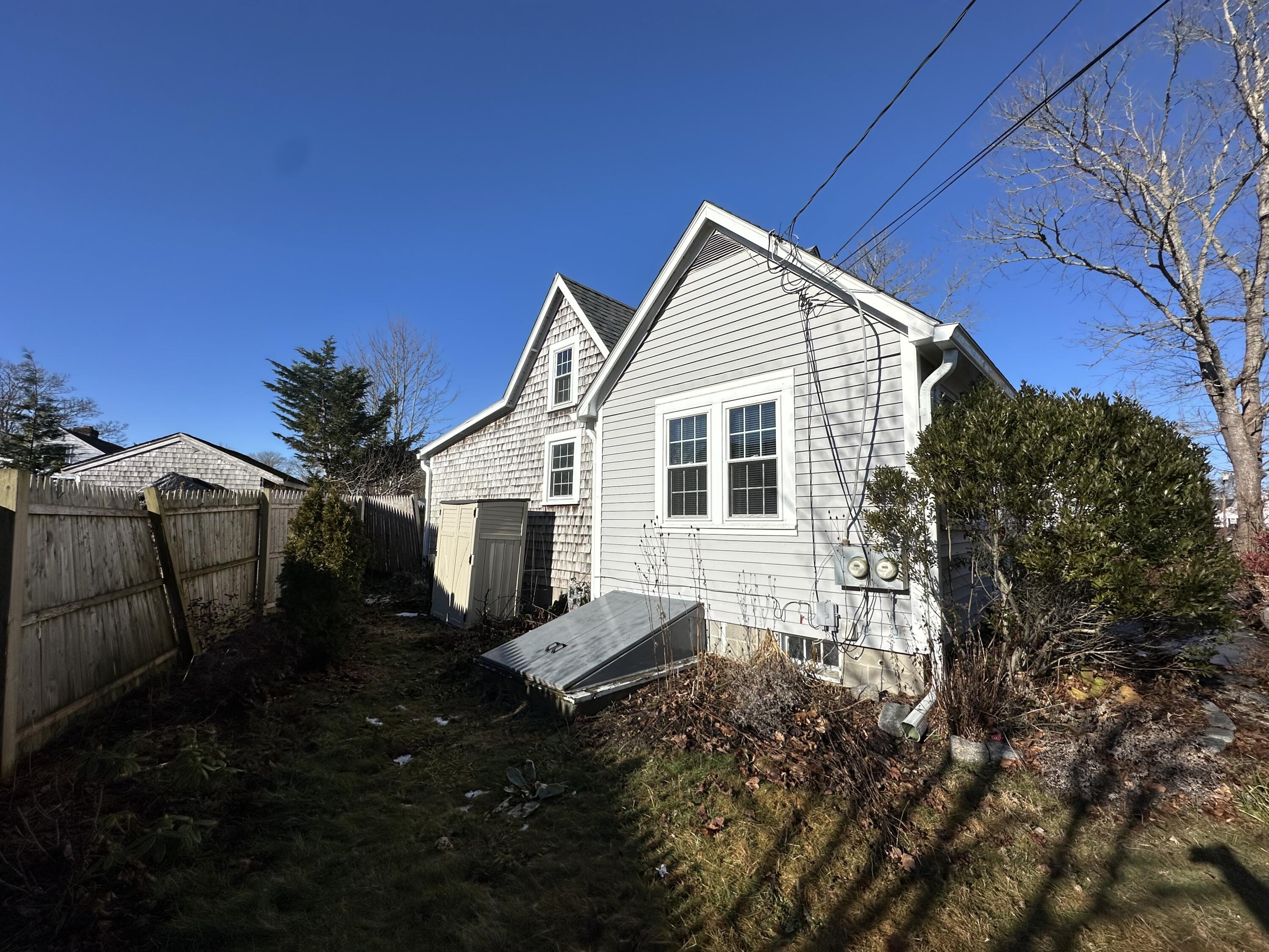117 Oak Neck Road Hyannis, MA 02601 - Photo 5 of 25 a view of a house with a yard