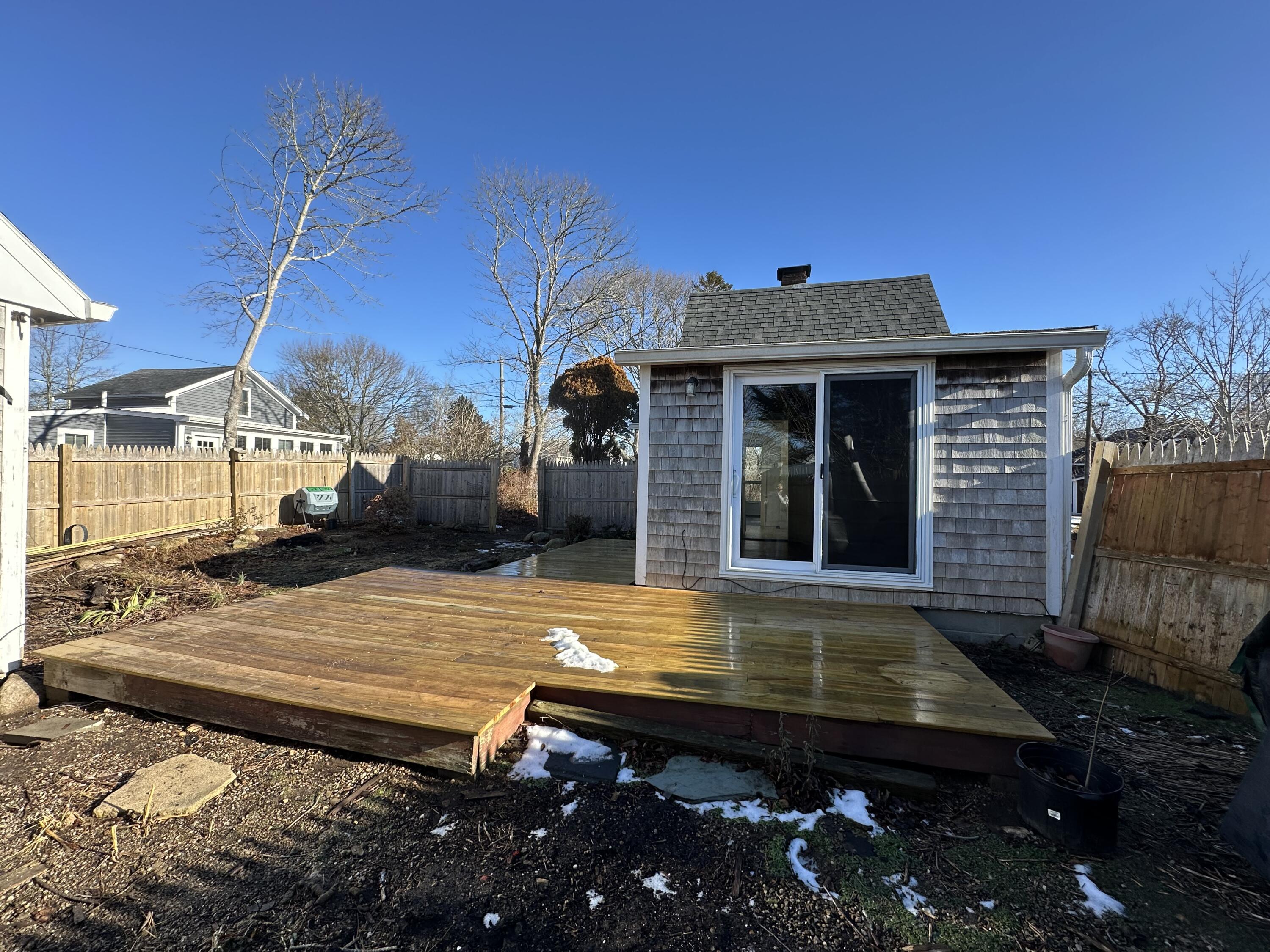 117 Oak Neck Road Hyannis, MA 02601 - Photo 10 of 25 a view of a backyard with a patio