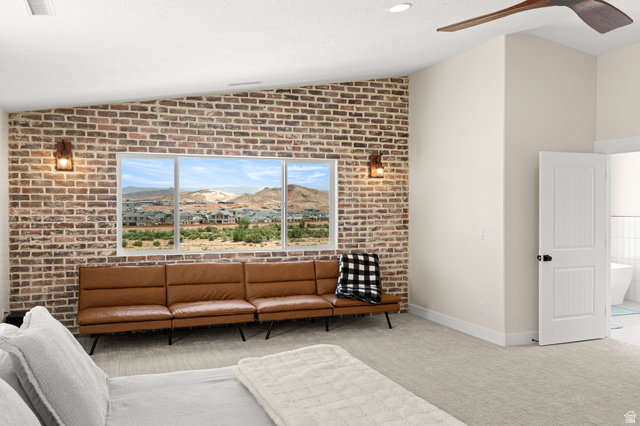 2591 East Washington Dam Road Washington, UT 84780 - Photo 20 of 67 Exposed brick accent wall with three large windows