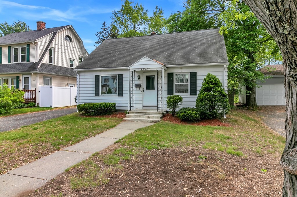 122 Prentice Street Springfield, MA 01104 - Photo 2 of 32 a aerial view of a house with yard and plants