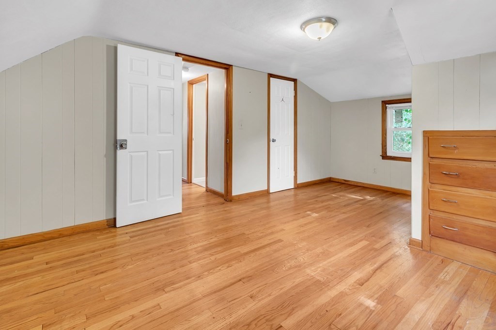 122 Prentice Street Springfield, MA 01104 - Photo 21 of 32 an empty room with wooden floor and closet