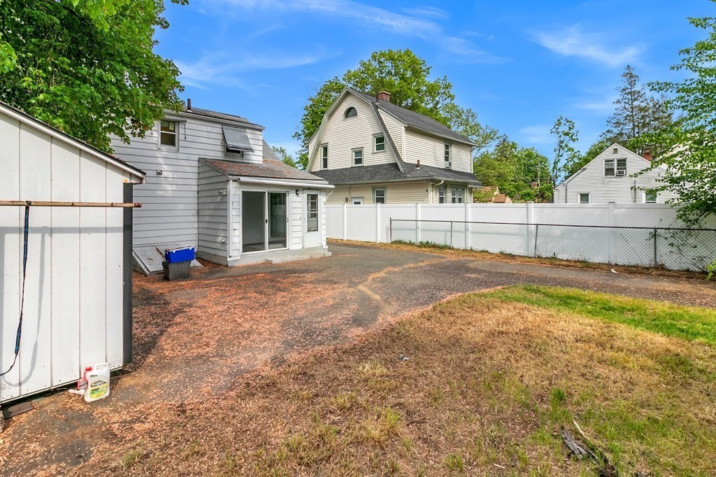 122 Prentice Street Springfield, MA 01104 - Photo 28 of 32 a view of a house with a yard