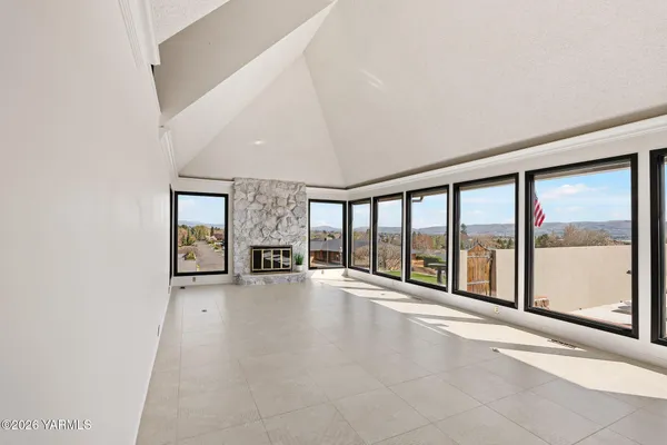 a view of an empty room with a sliding door