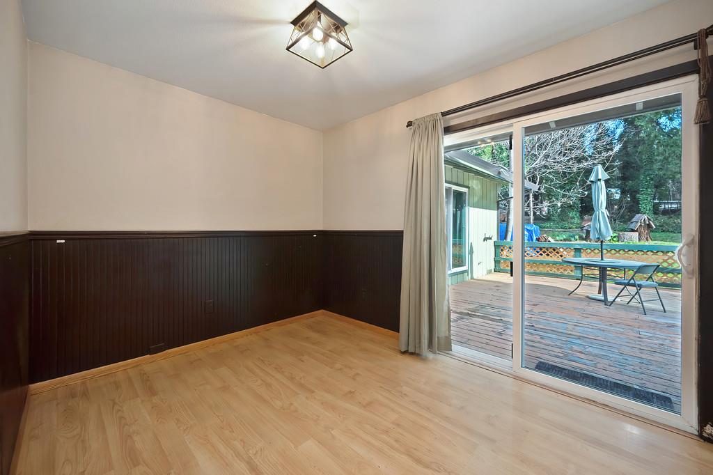 2917 Shadow Lane Pollock Pines, CA 95726 - Photo 12 of 29 a bedroom with a bed and a large window