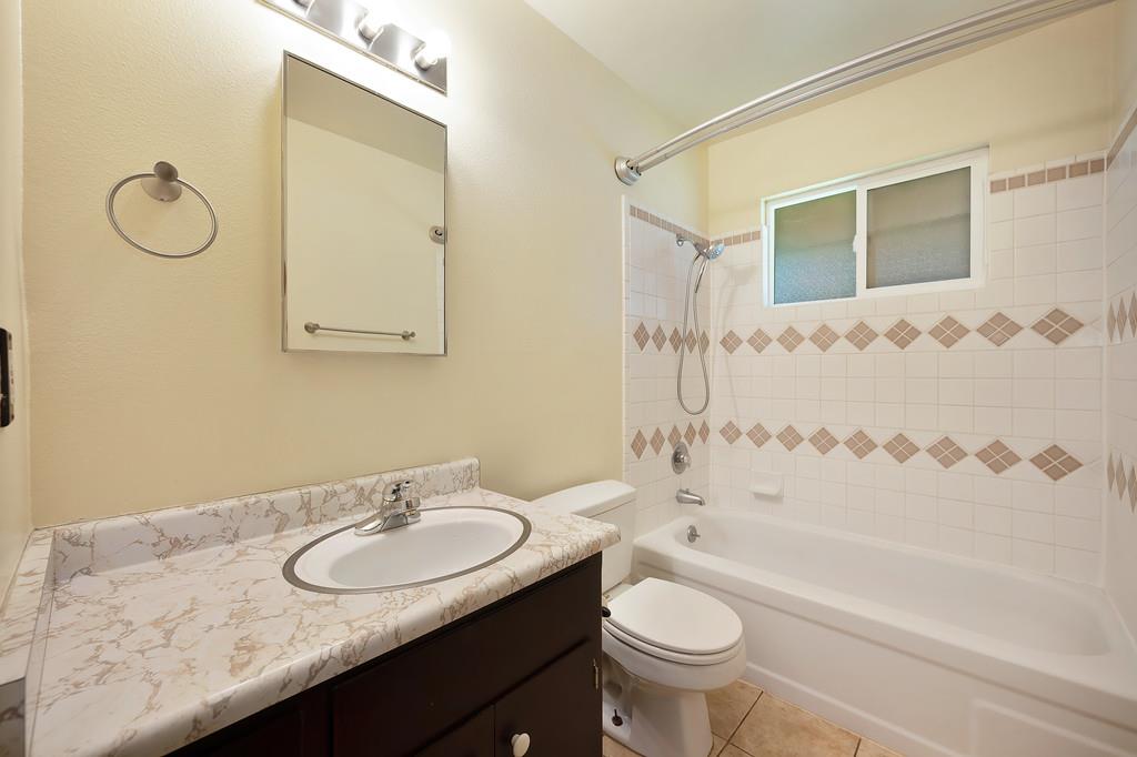 2917 Shadow Lane Pollock Pines, CA 95726 - Photo 13 of 29 a bathroom with a sink a toilet and shower