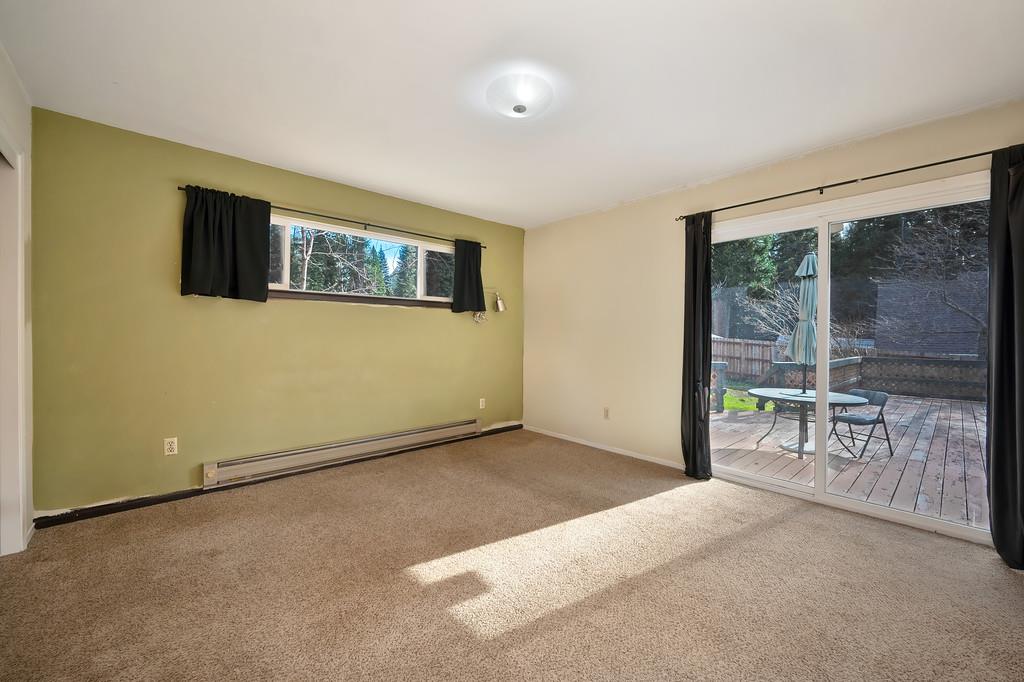 2917 Shadow Lane Pollock Pines, CA 95726 - Photo 19 of 29 a view of a livingroom with furniture and floor to ceiling window