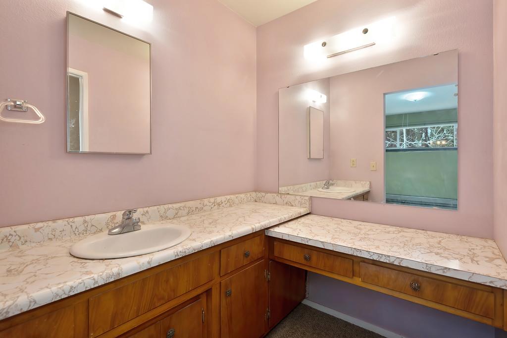 2917 Shadow Lane Pollock Pines, CA 95726 - Photo 20 of 29 a bathroom with a sink and a mirror