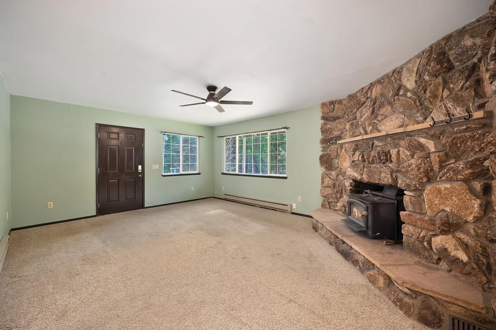 2917 Shadow Lane Pollock Pines, CA 95726 - Photo 6 of 29 a view of an empty room with a fireplace