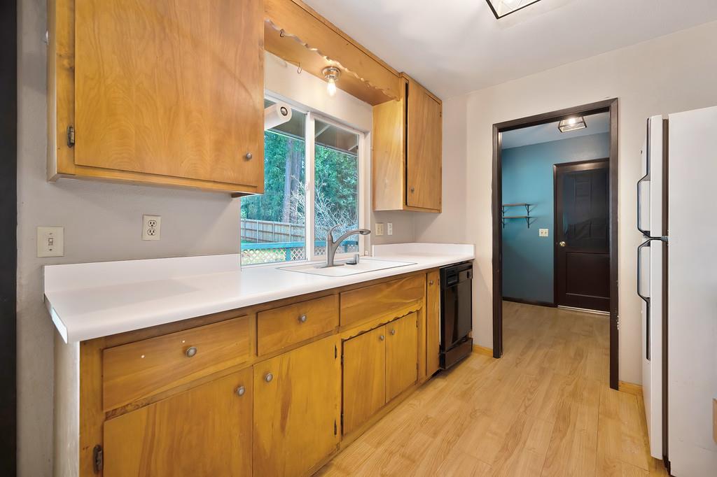 2917 Shadow Lane Pollock Pines, CA 95726 - Photo 8 of 29 a bathroom with a sink and a mirror