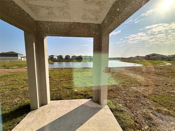 a view of a swimming pool and outdoor space