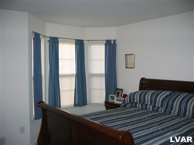 106 Bethpage Terrace Easton, PA 18042 - Photo 11 of 21 a living room with a couch