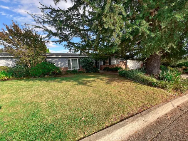 a view of swimming pool with an outdoor seating