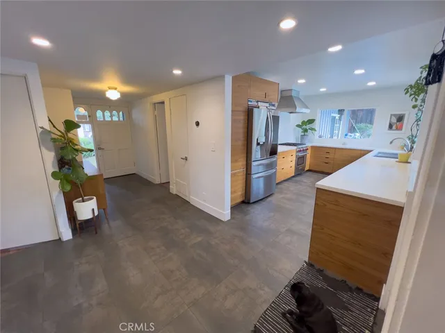 a view of a kitchen and utility room