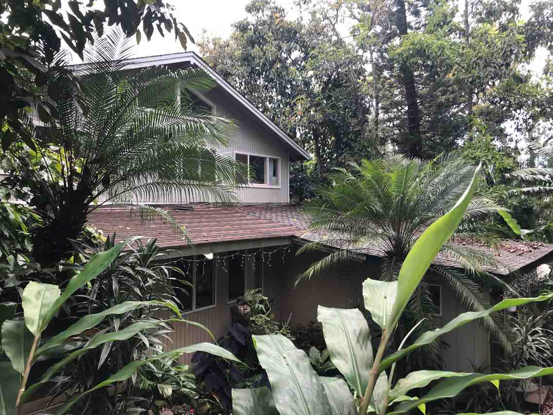 15 Olinda Road Makawao, HI 96768 - Photo 2 of 18 a front view of house with yard and trees around