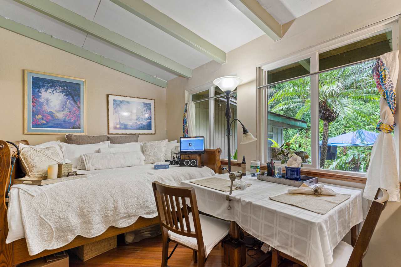15 Olinda Road Makawao, HI 96768 - Photo 4 of 18 a living room with furniture and a large window