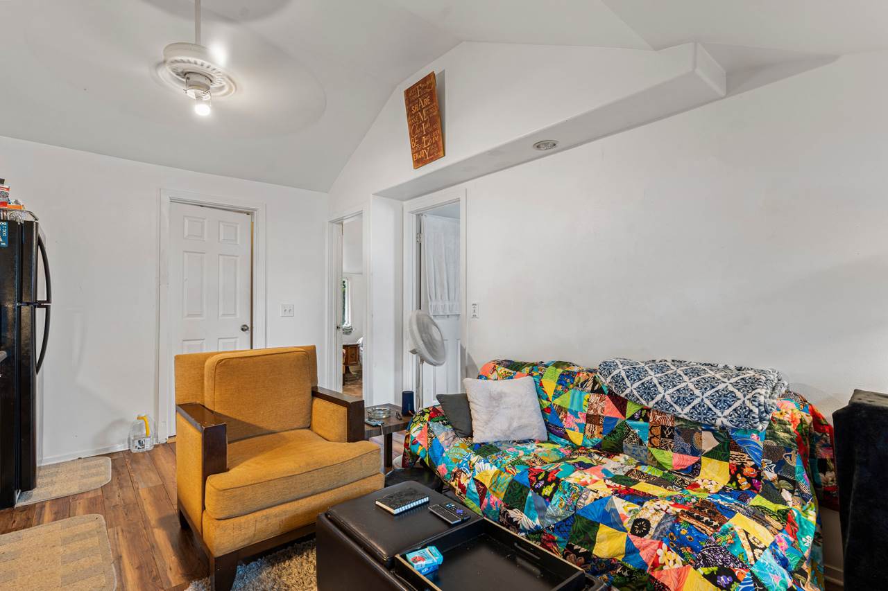 15 Olinda Road Makawao, HI 96768 - Photo 9 of 18 a bedroom with furniture and a couch