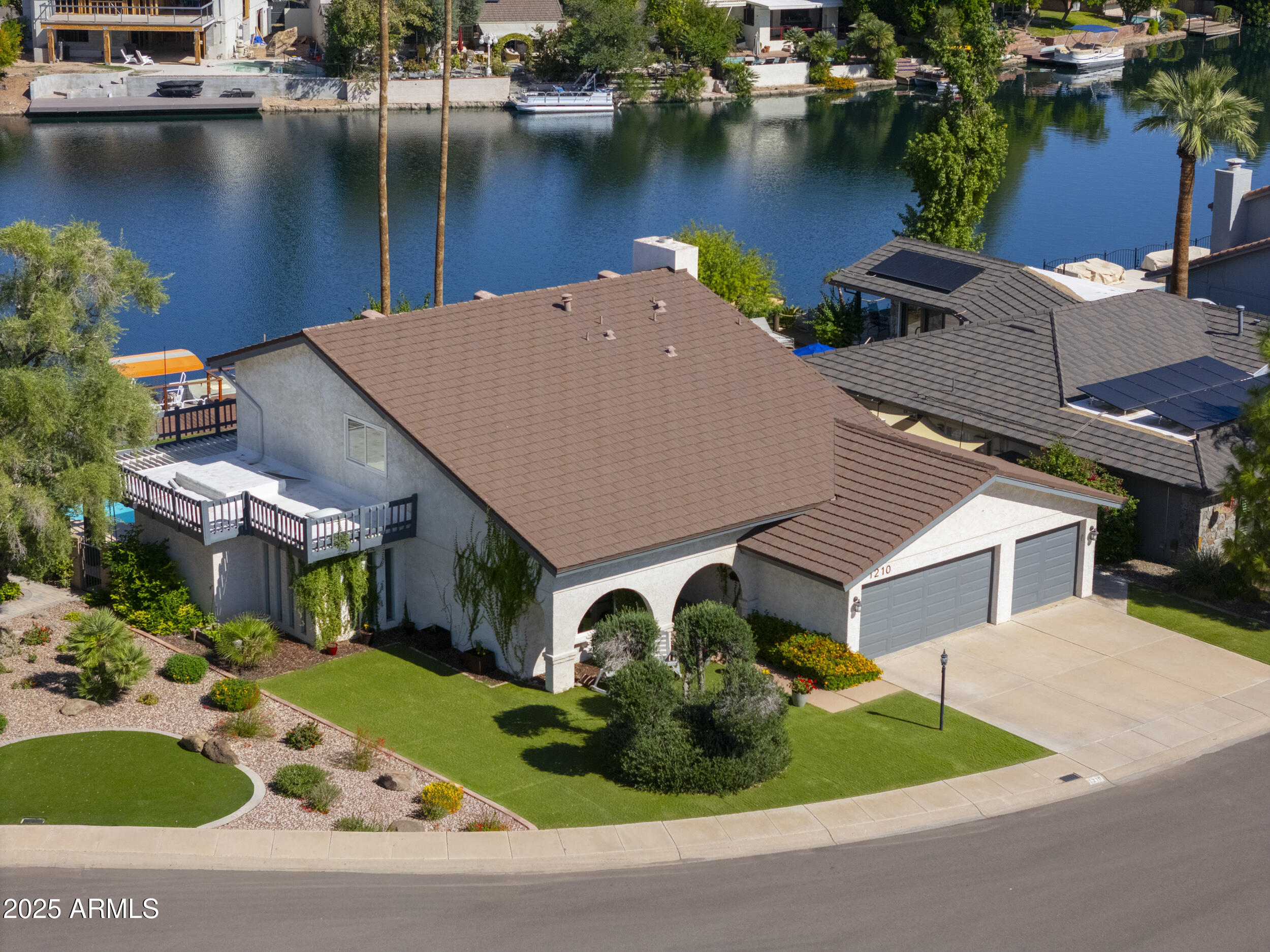 1210 East Harbor View Drive Tempe, AZ 85283 - Photo 2 of 68 an aerial view of a house with swimming pool and outdoor space
