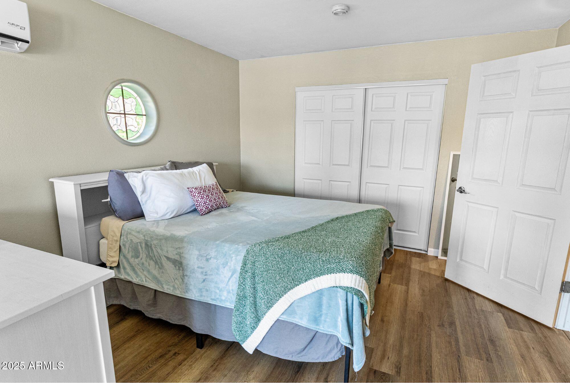1210 East Harbor View Drive Tempe, AZ 85283 - Photo 26 of 68 a bedroom with a bed and a closet