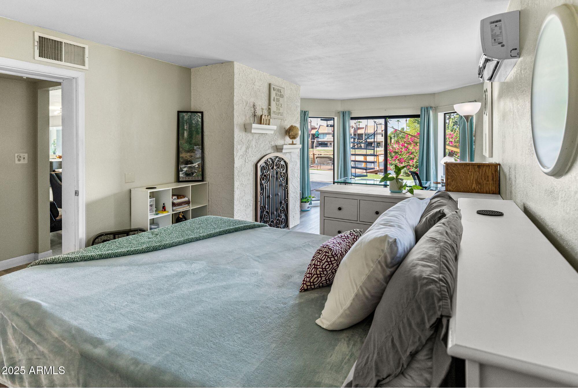 1210 East Harbor View Drive Tempe, AZ 85283 - Photo 27 of 68 a living room with furniture and a large window