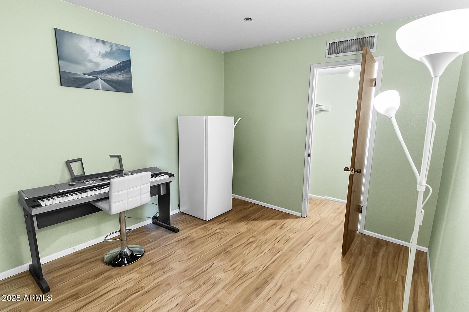 1210 East Harbor View Drive Tempe, AZ 85283 - Photo 29 of 68 a view of a room with wooden floor and stairs