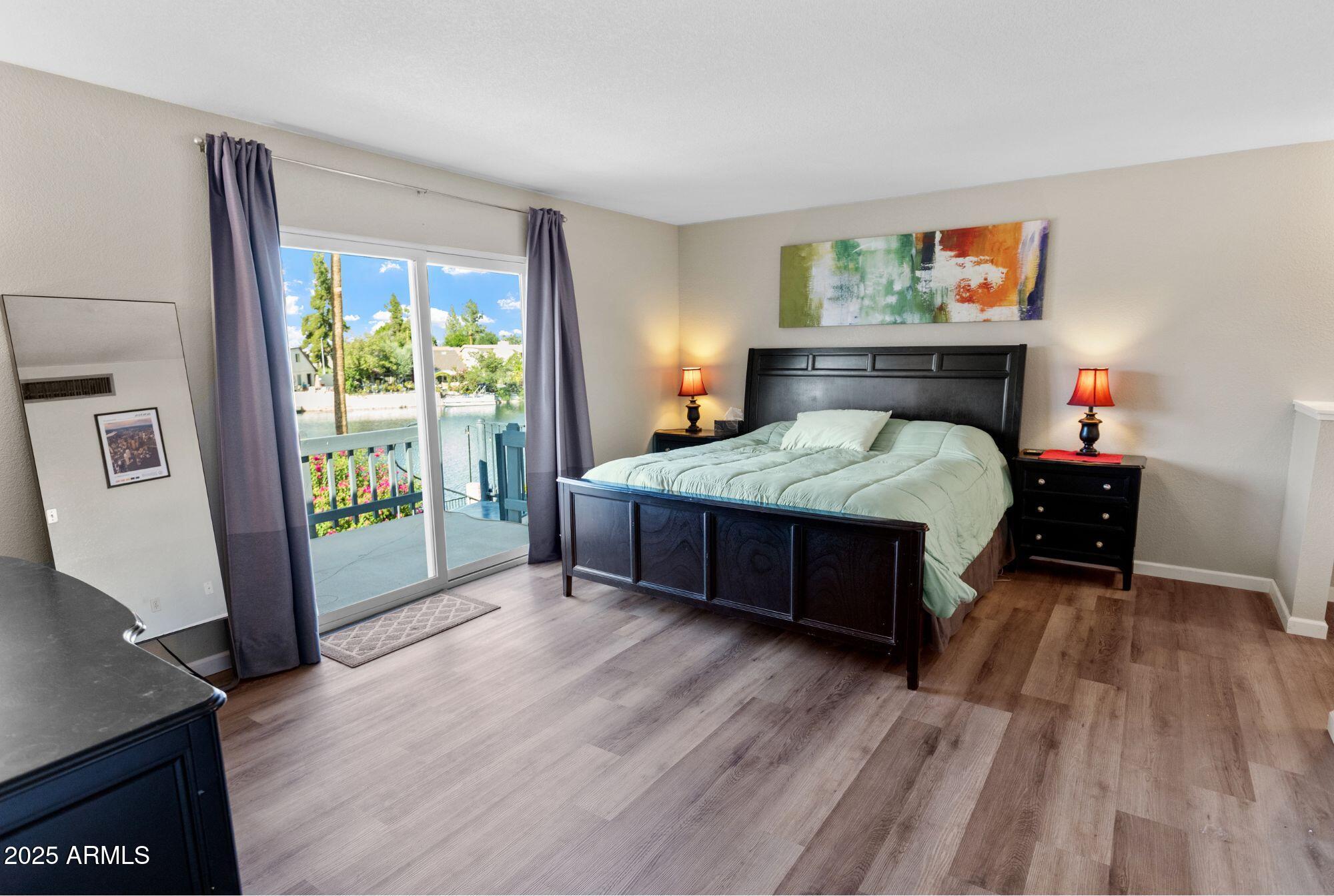 1210 East Harbor View Drive Tempe, AZ 85283 - Photo 33 of 68 a bedroom with a bed and a window