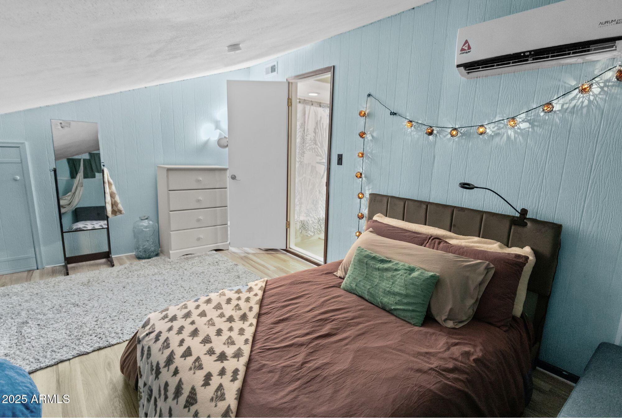 1210 East Harbor View Drive Tempe, AZ 85283 - Photo 41 of 68 a bedroom with a bed and cabinets